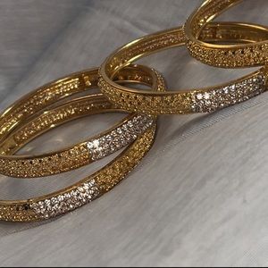 GOLD AND WHITE GOLD INDIAN BANGLES (SET OF 4)